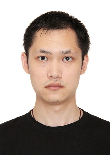 A person with short dark hair wearing a black shirtAI-generated content may be incorrect.